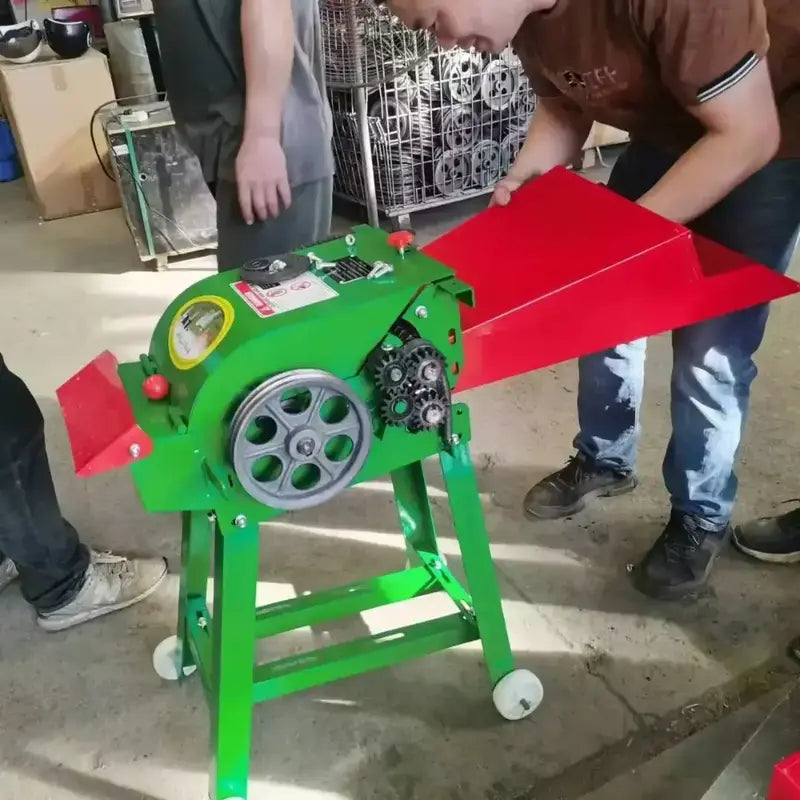 Rare Machinery chaff cutter machine for agriculture being assembled by workers in a workshop