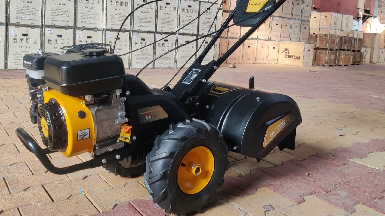 Rare Machinery Mini Tiller with 7.5 HP rotary tiller engine and durable tires for efficient gardening