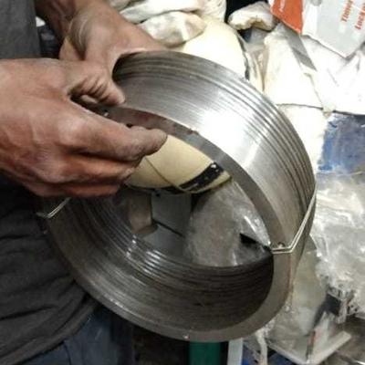 Rare Machinery spare part with hands holding circular steel ring component rice mill grinder frame for sale