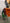 Rare Machinery corn thresher machine with an orange hopper for efficient grain processing